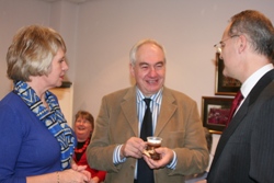 Diocesan Secretary June Butler chats to Arthur McCartney (centre) and the Rev Chris Eason at the coffee morning.